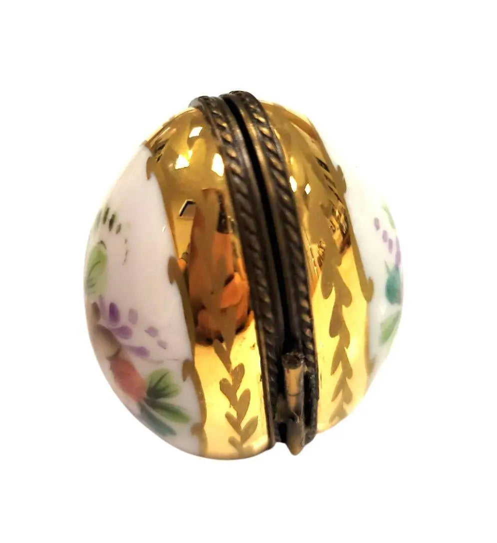 A thoughtful gift for Francophiles: the Flowered Egg Oval Picture Frame Limoges box
