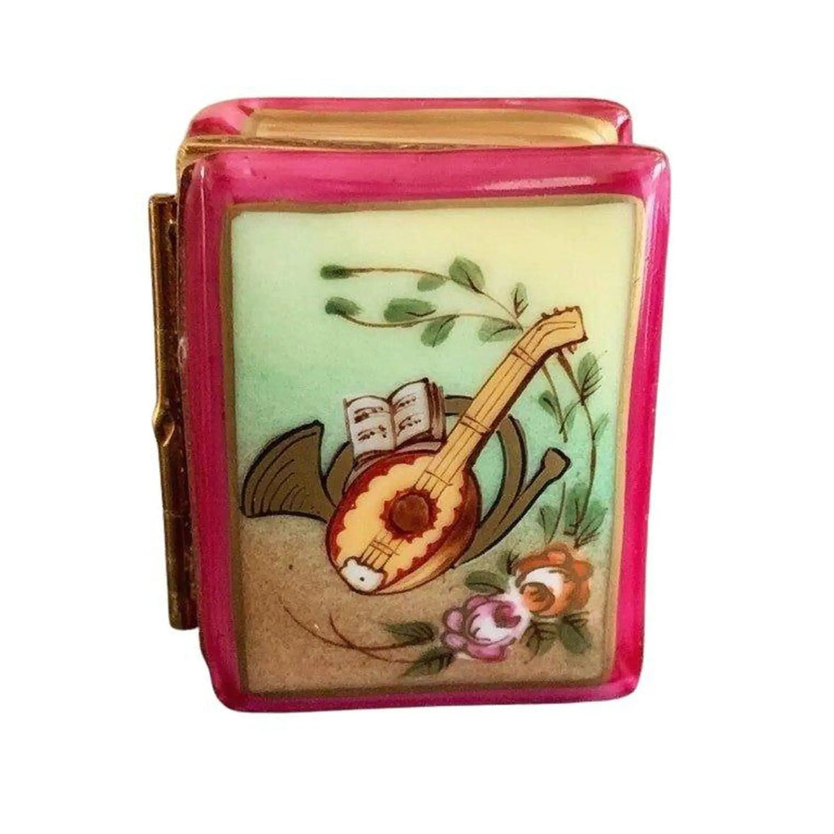The painter's artistry shows on this Horn Mandolin Rose music Book Limoges box