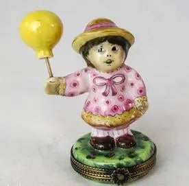 The painter's artistry shows on this Girl with Balloon Limoges box