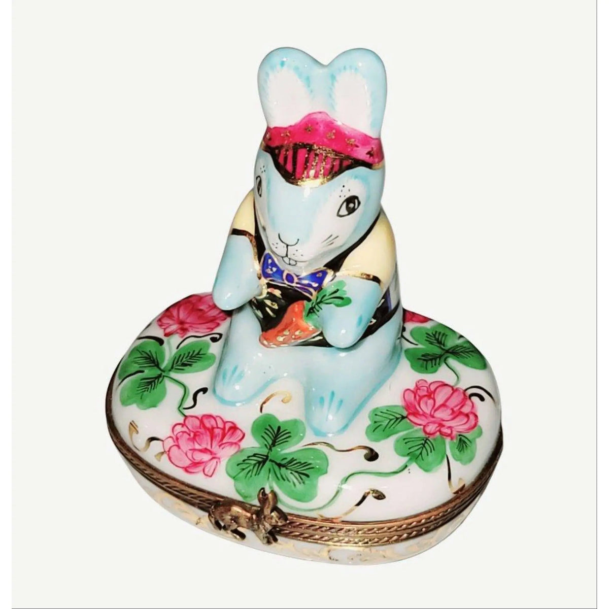 Limoges Boutique presents the Good Luck Blue Game Rabbit on Flowers, a genuine Limoges box painted by hand in France