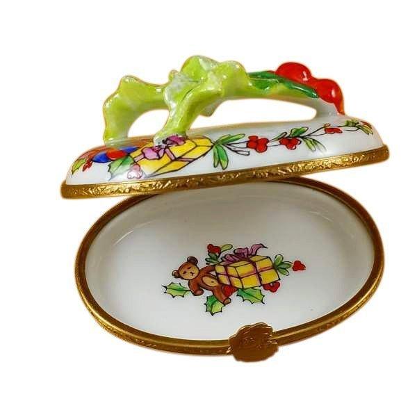 Fine art lovers will admire this Holly Leaf on Oval Limoges box