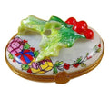 Limoges Boutique presents the Rochard Holly Leaf on Oval, a genuine Limoges box painted by hand in France