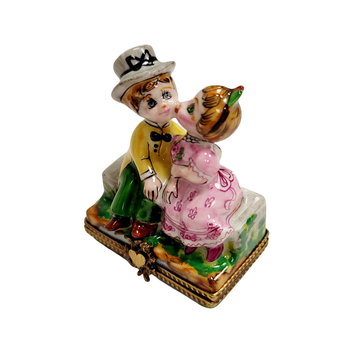 Every brushstroke by hand on the Kids Kissing Couple Limoges box from France