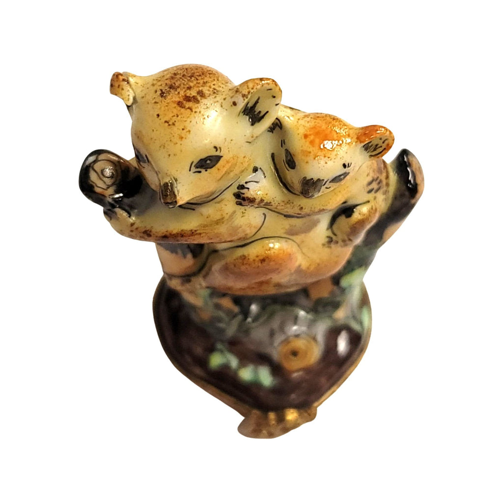 Koala family seen from above, speckled fur brushed by hand on fine French porcelain