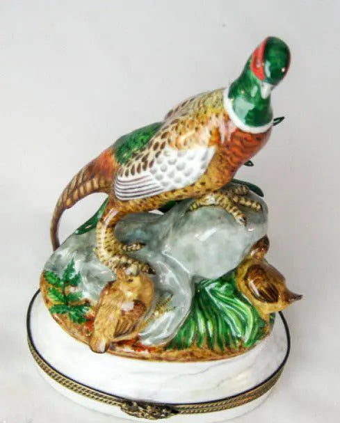 Painted details on the Large Pheasant Limoges box, French art in miniature