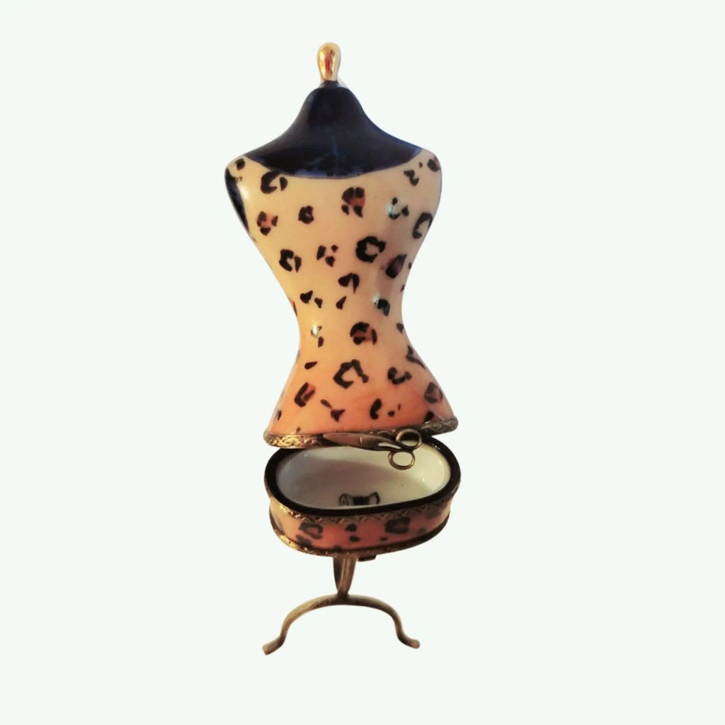 Fine French craftsmanship on the Mannequin Leapard Blue Print Fashion Dress Limoges box, painted by hand