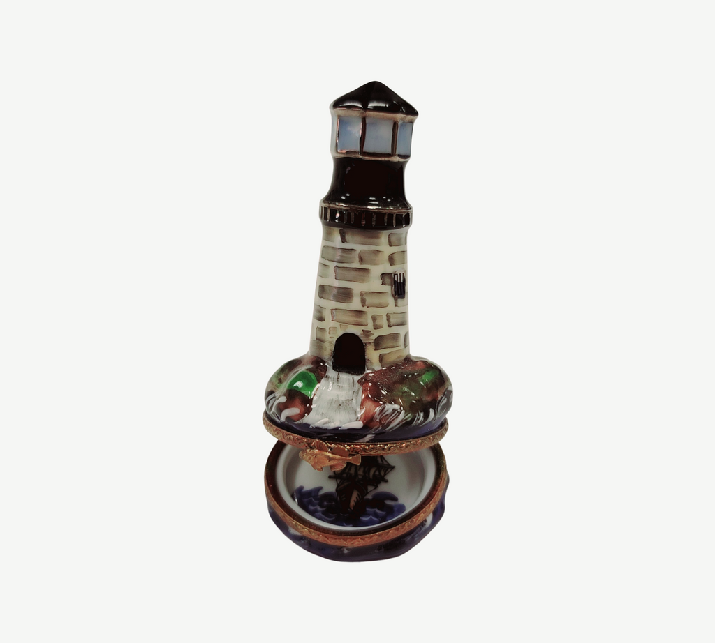 Artisan-painted Lighthouse on Rocks Limoges box from France, a cherished collectible