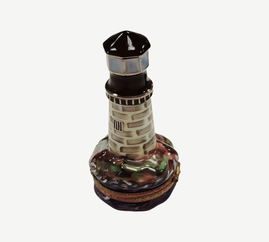 The painter's artistry shows on this Lighthouse on Rocks Limoges box