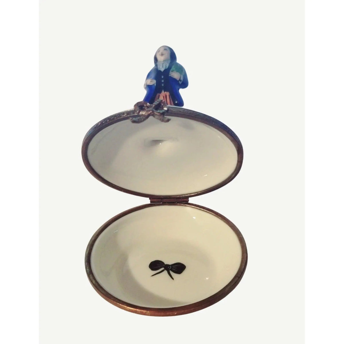 The Lord Williams Oxford Welch Man Serenade, a Limoges keepsake with true French charm