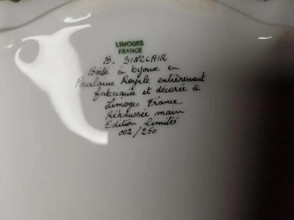 Underside of the Lovers box with its hand-lettered Limoges France signature and edition number out of 250