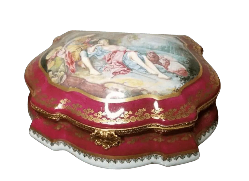 Scalloped crimson Lovers Limoges box with a romantic courting scene on the lid, gilded in fine French style