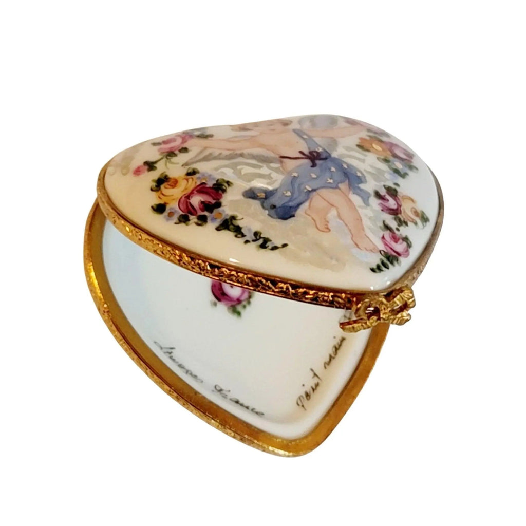 Painted details on the Loving Wishes Cherub Heart Limoges box, French art in miniature