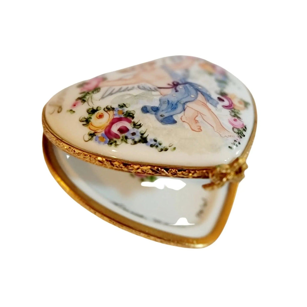 The painter's artistry shows on this Loving Wishes Cherub Heart Limoges box