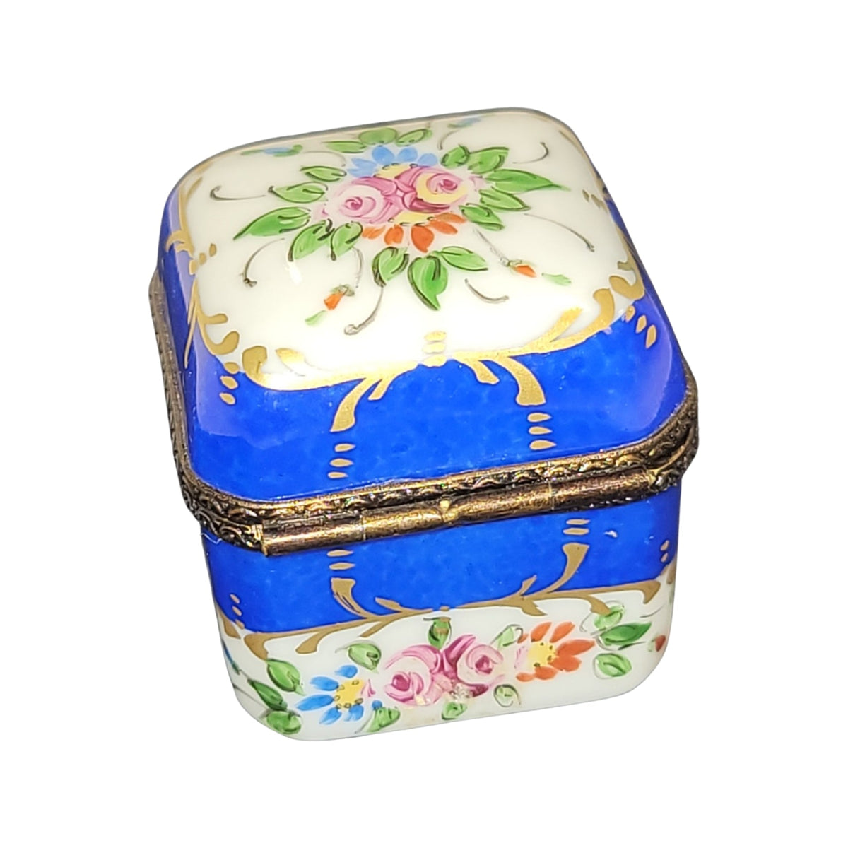 Fine French craftsmanship on the 4 Perfume Blue in Square Limoges box, painted by hand