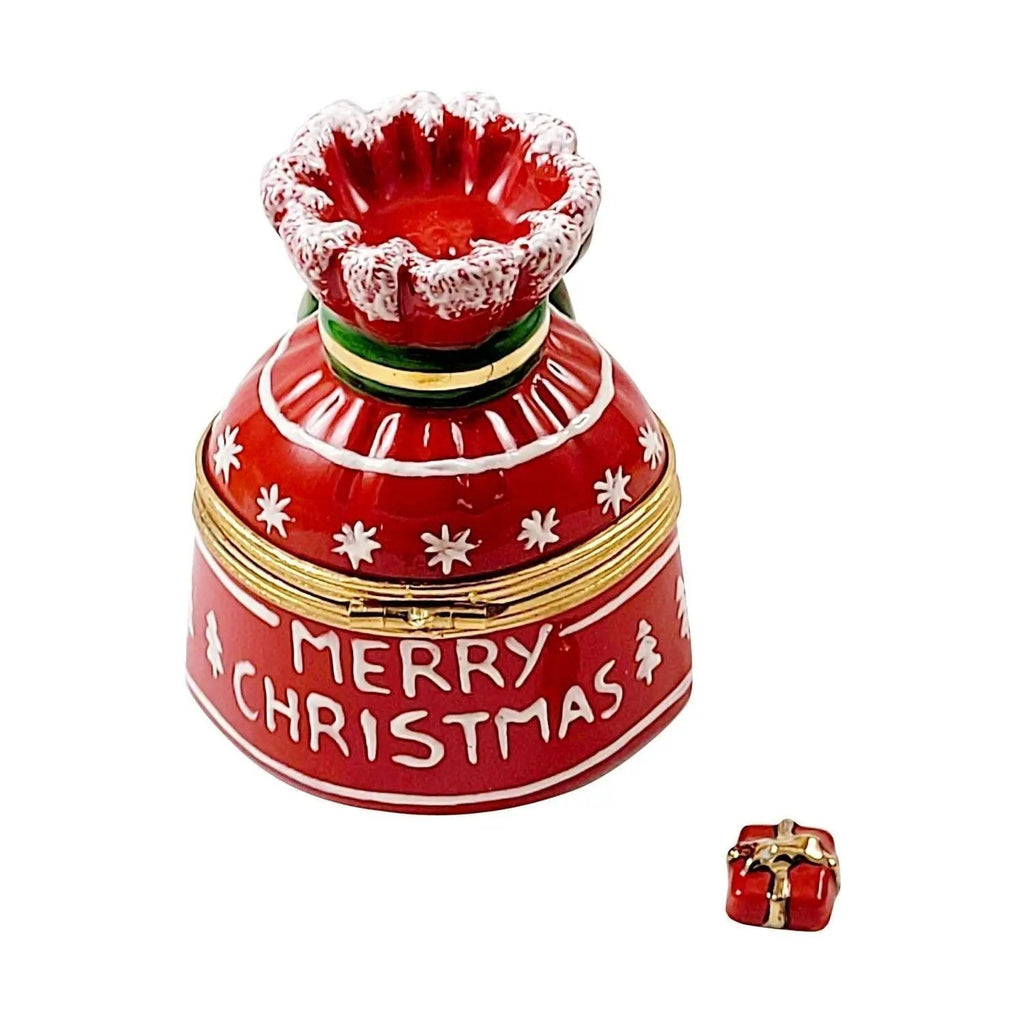 The painter's artistry shows on this Merry Christmas Bag Cheer Limoges box