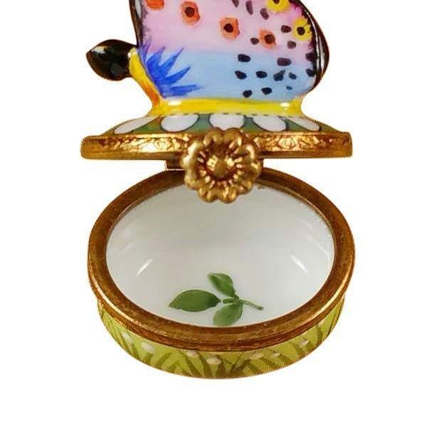 Treasured French collectible: Mini Butterfly on Daisy Limoges box, painted by hand