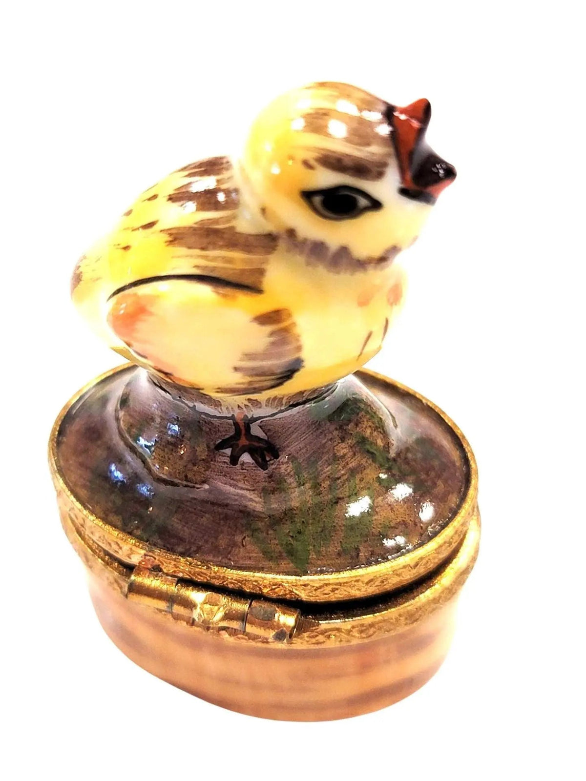 Painted details on the Mini Chick Limoges box, French art in miniature