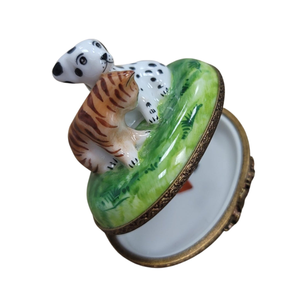 Fine French craftsmanship on the Mini Dalmation Dog with Cat Limoges box, painted by hand