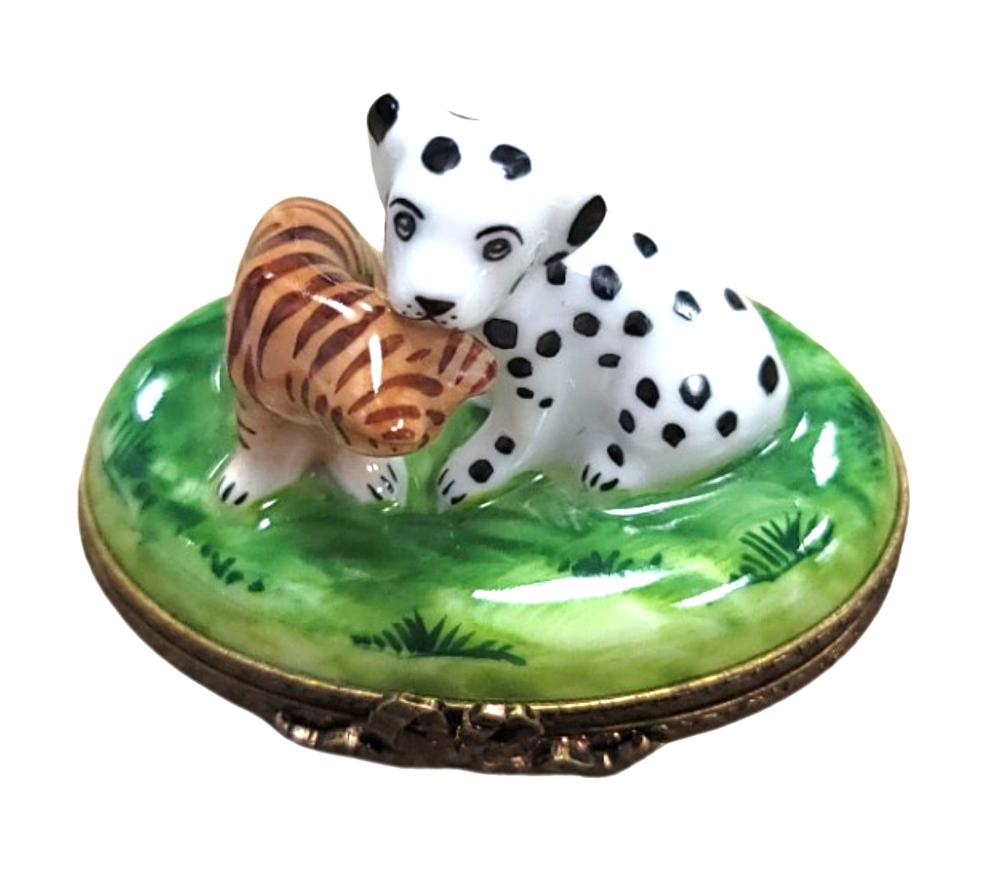 Limoges Boutique presents the Mini Dalmation Dog with Cat, a genuine Limoges box painted by hand in France