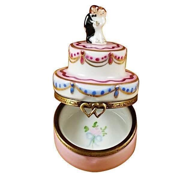 Fine French craftsmanship on the Mini Wedding Cake with Bride and Groom Limoges box, painted by hand