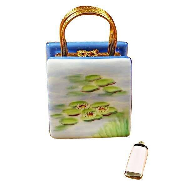 The painter's artistry shows on this Monet Bag with Bridge & Water Lily Limoges box