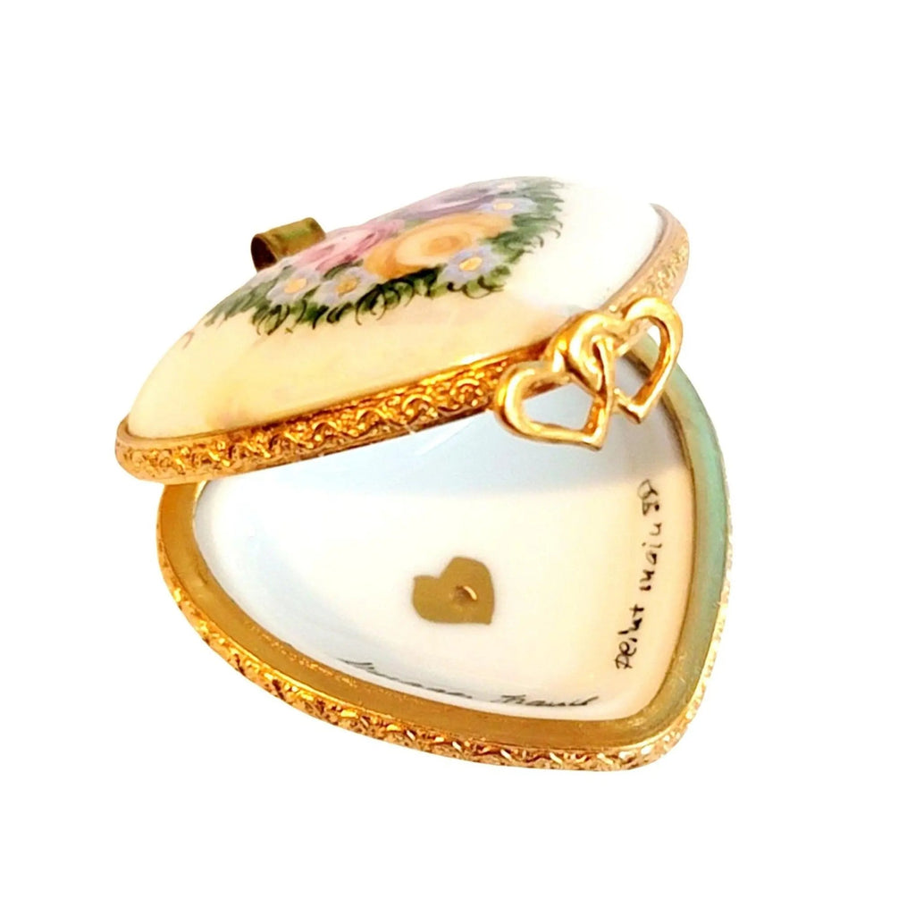 Fine French craftsmanship on the Mother Sweetheart Pendant for Her Limoges box, painted by hand