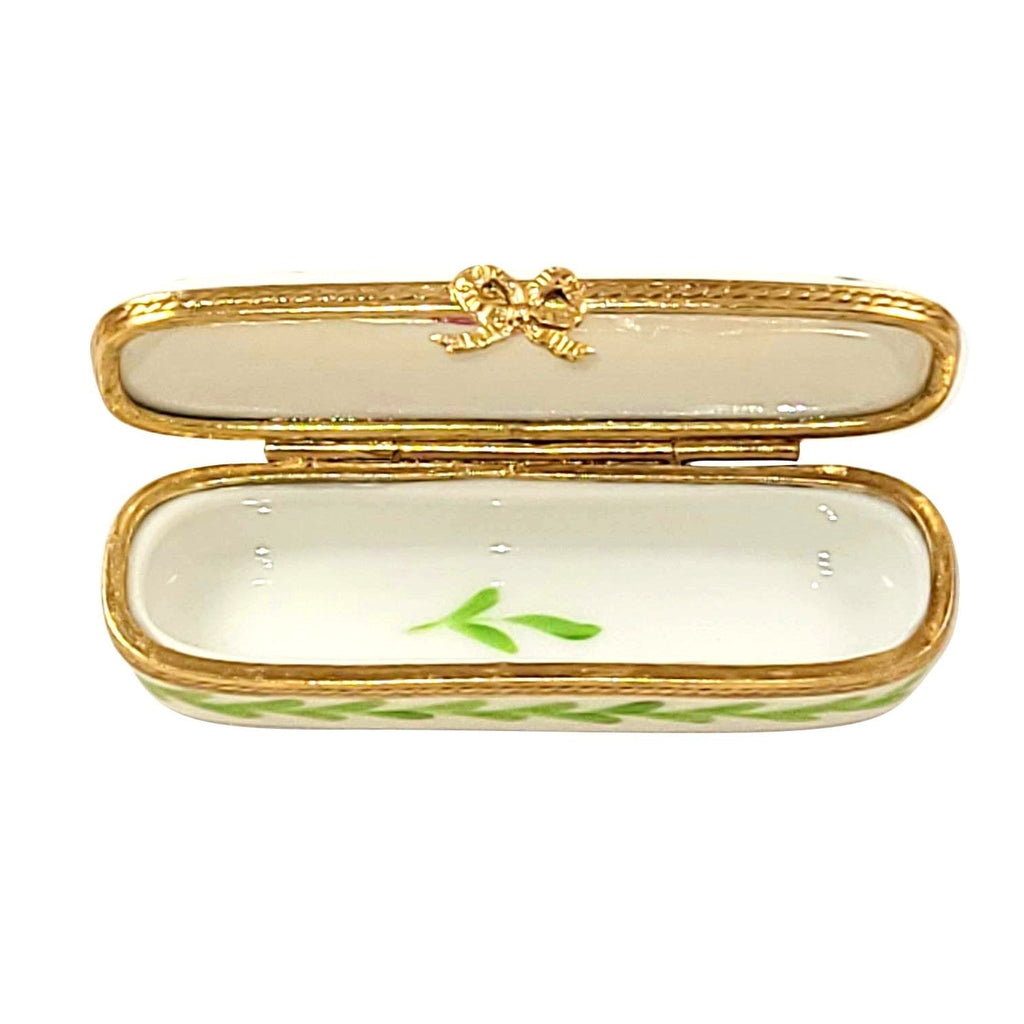 Every brushstroke by hand on the Oblong Happy Anniversary Limoges box from France