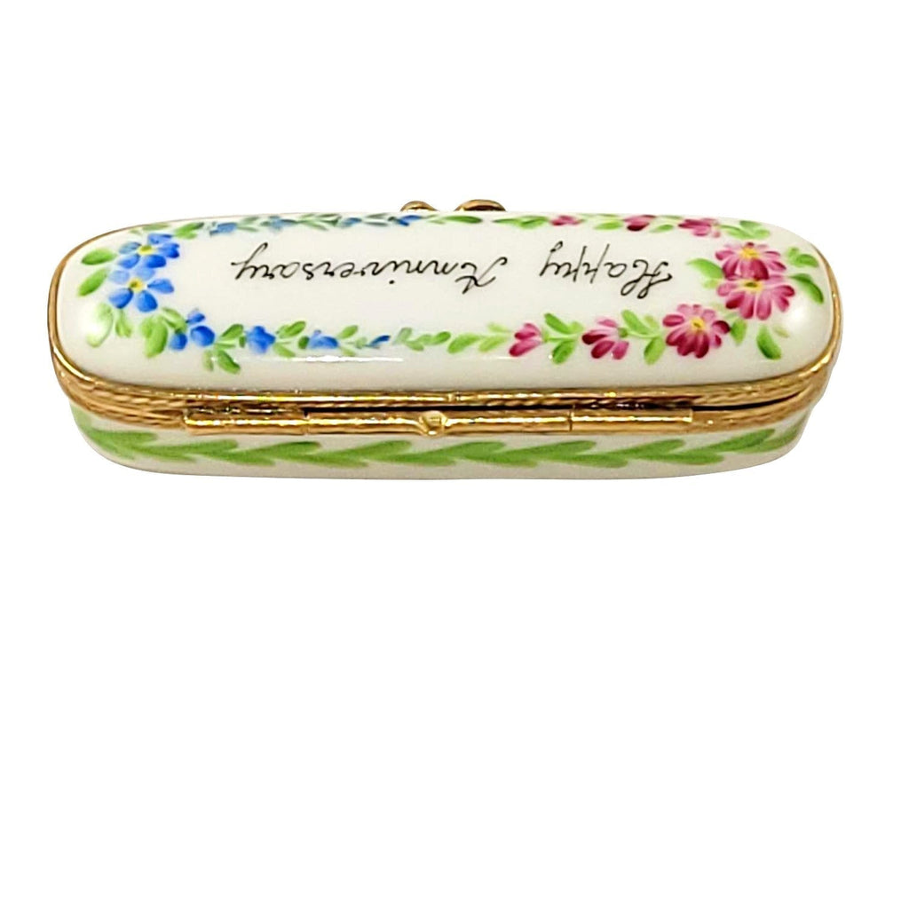 Fine art lovers will admire this Oblong Happy Anniversary Limoges box