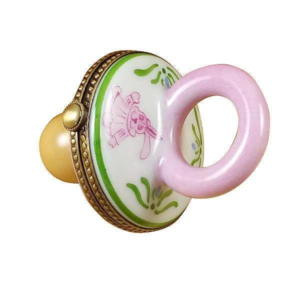Limoges Boutique presents the Rochard Pink Pacifier with Rabbits, a genuine Limoges box painted by hand in France