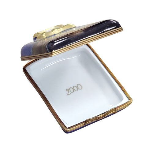 Fine French craftsmanship on the 2000 Paris Fireworks Shirt Set Limoges box, painted by hand