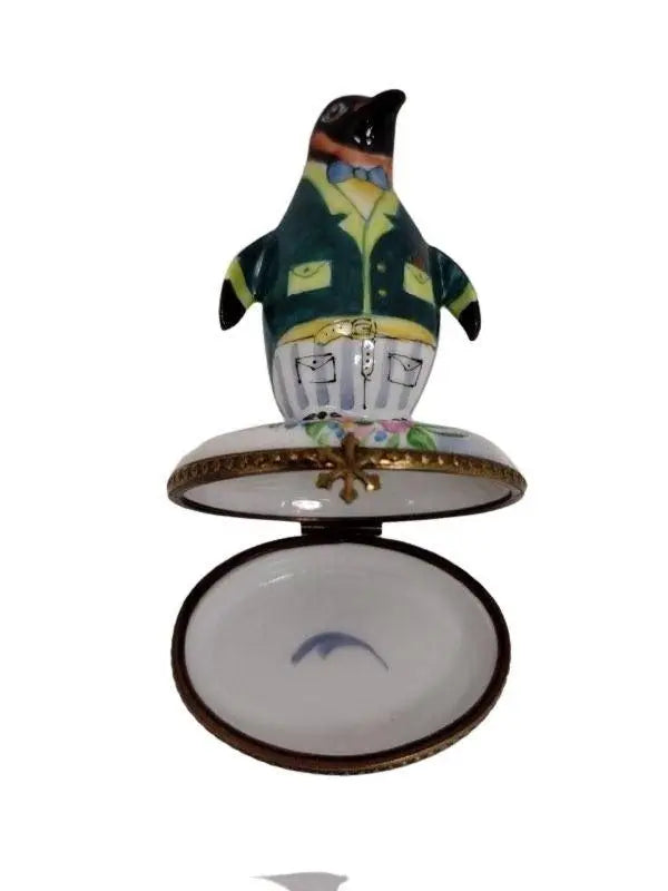 Gift idea for someone who loves France: Penguin with Flowers Tuxedo Limoges box