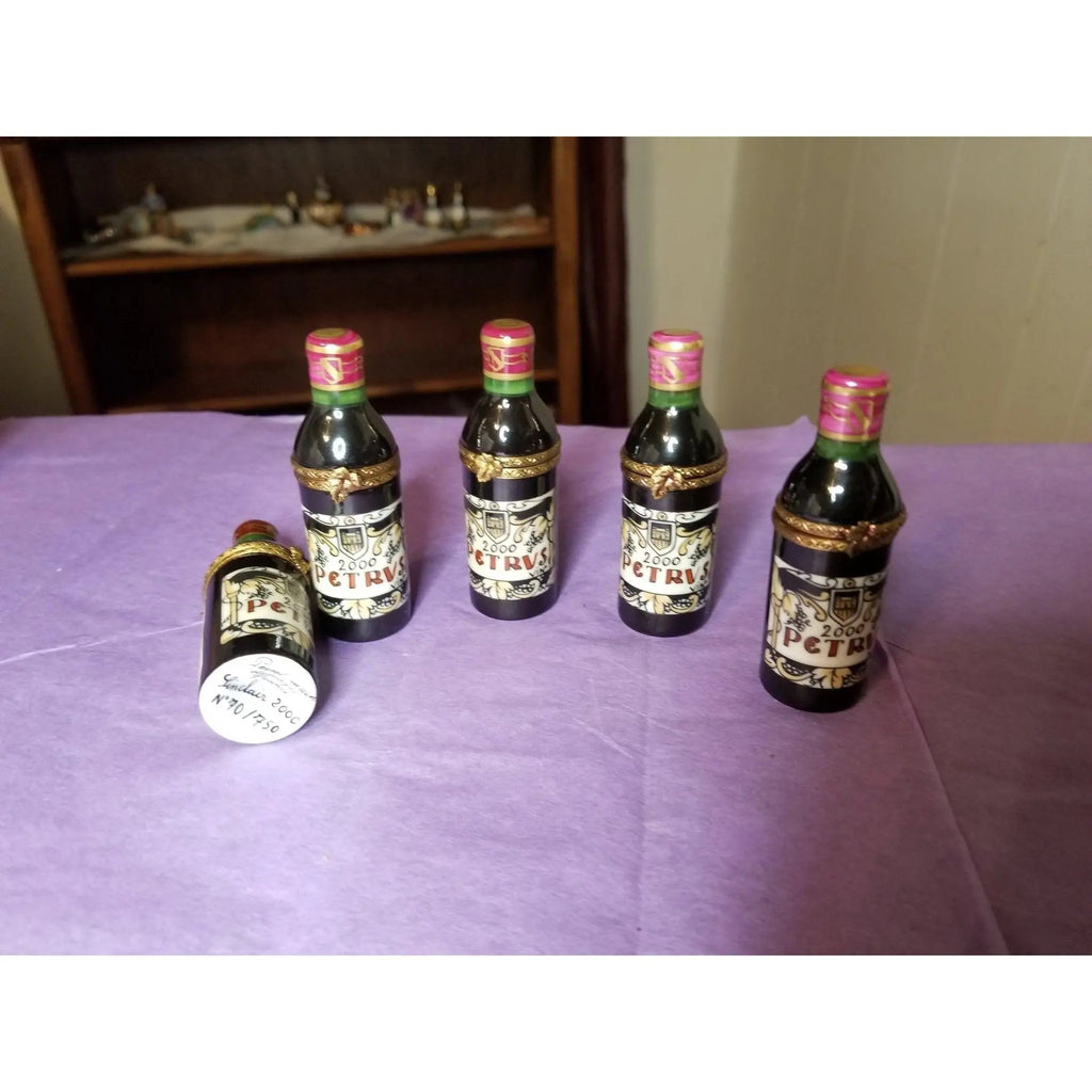 Every brushstroke by hand on the Petrus Wine Bottle Limoges box from France