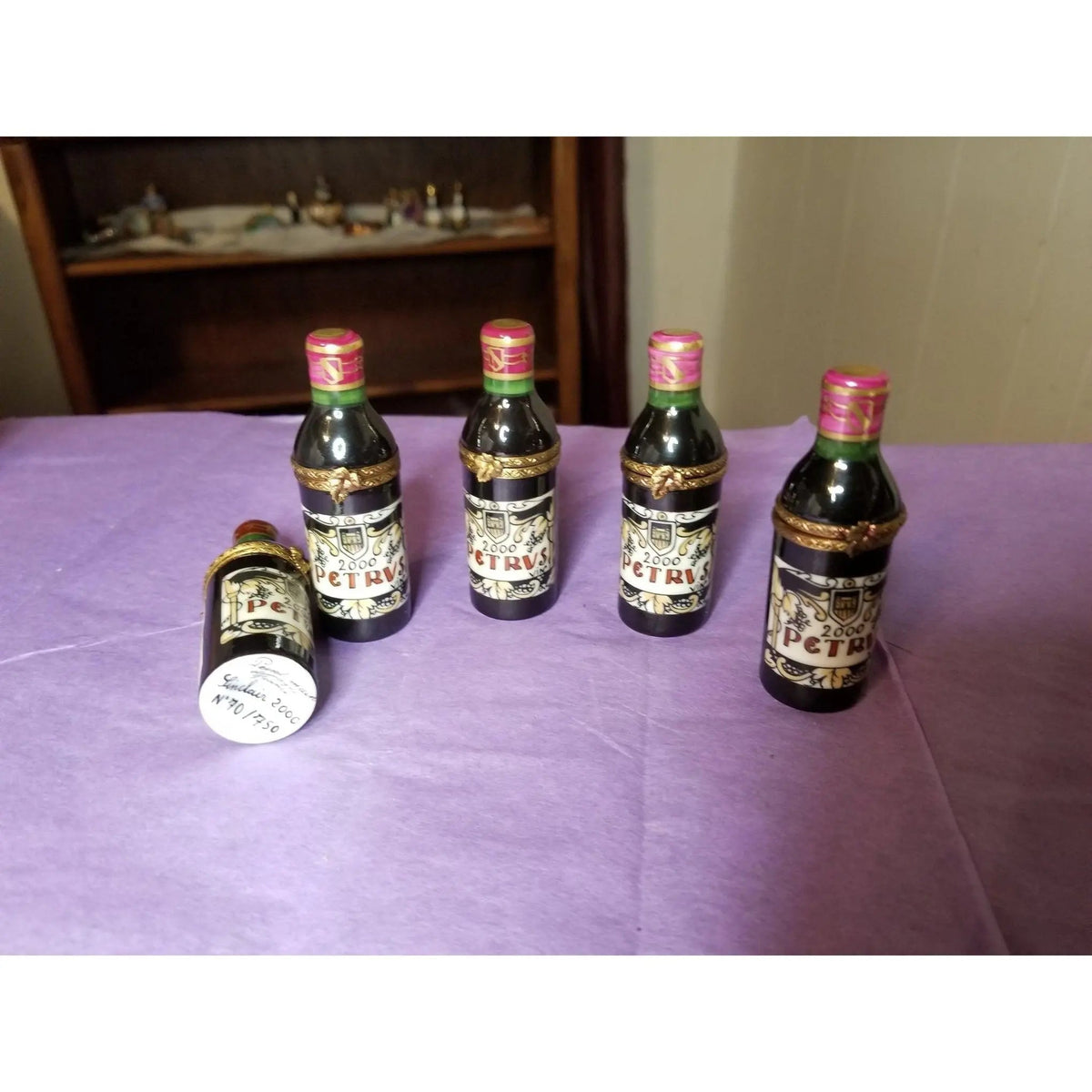 Every brushstroke by hand on the Petrus Wine Bottle Limoges box from France