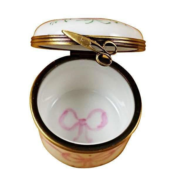 Treasured French collectible: Pink First Curl Limoges box, painted by hand
