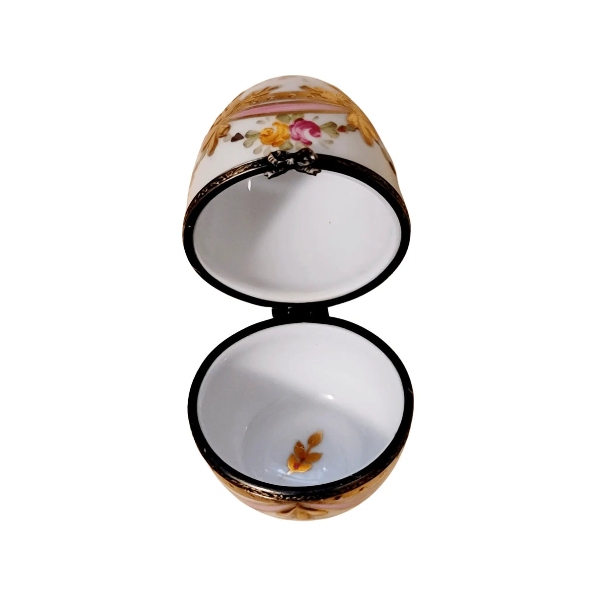 Fine French craftsmanship on the Pink Egg with Gold Ribbons Limoges box, painted by hand