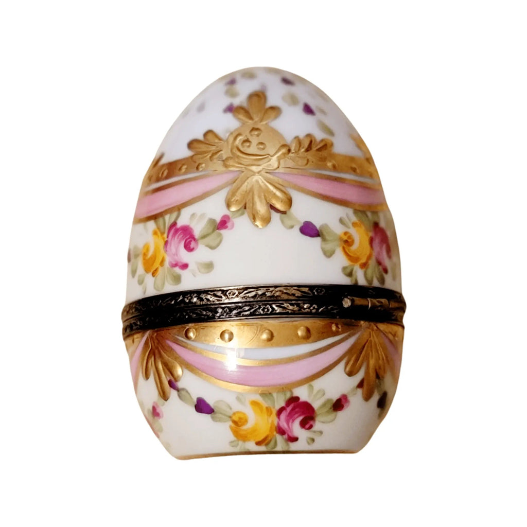 A thoughtful gift for Francophiles: the Pink Egg with Gold Ribbons Limoges box