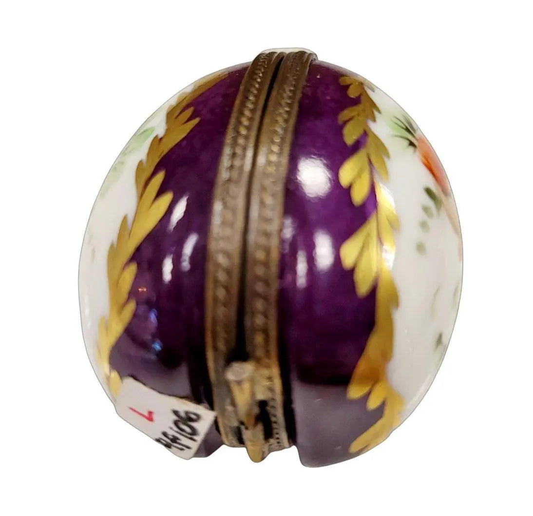 Fine art lovers will admire this Purple Egg Perfume Limoges box