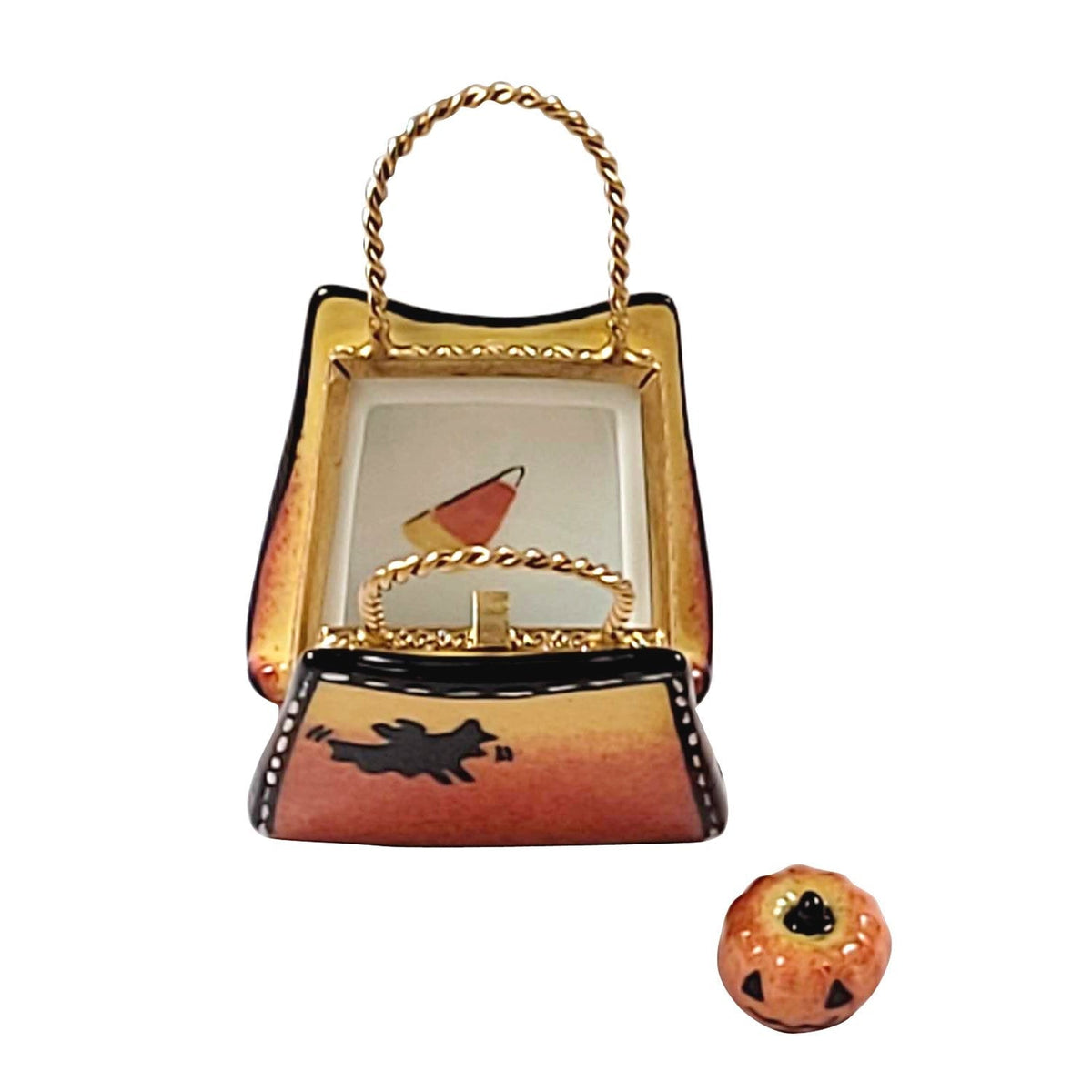 Trick or Treat Bag with Candy Pumpkin Charm Limoges box opened to show the inside, a keepsake to tuck a treasure in
