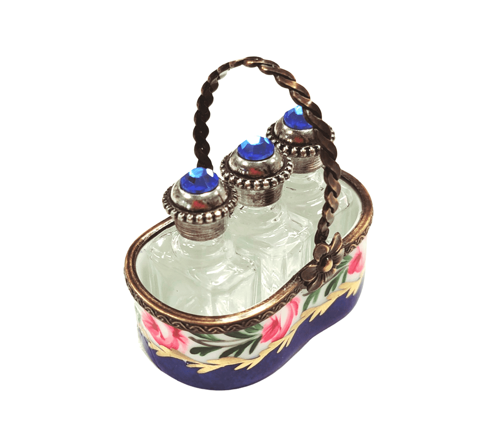Limoges Boutique presents the 3 Perfumes in Basket Blue, a genuine Limoges box painted by hand in France