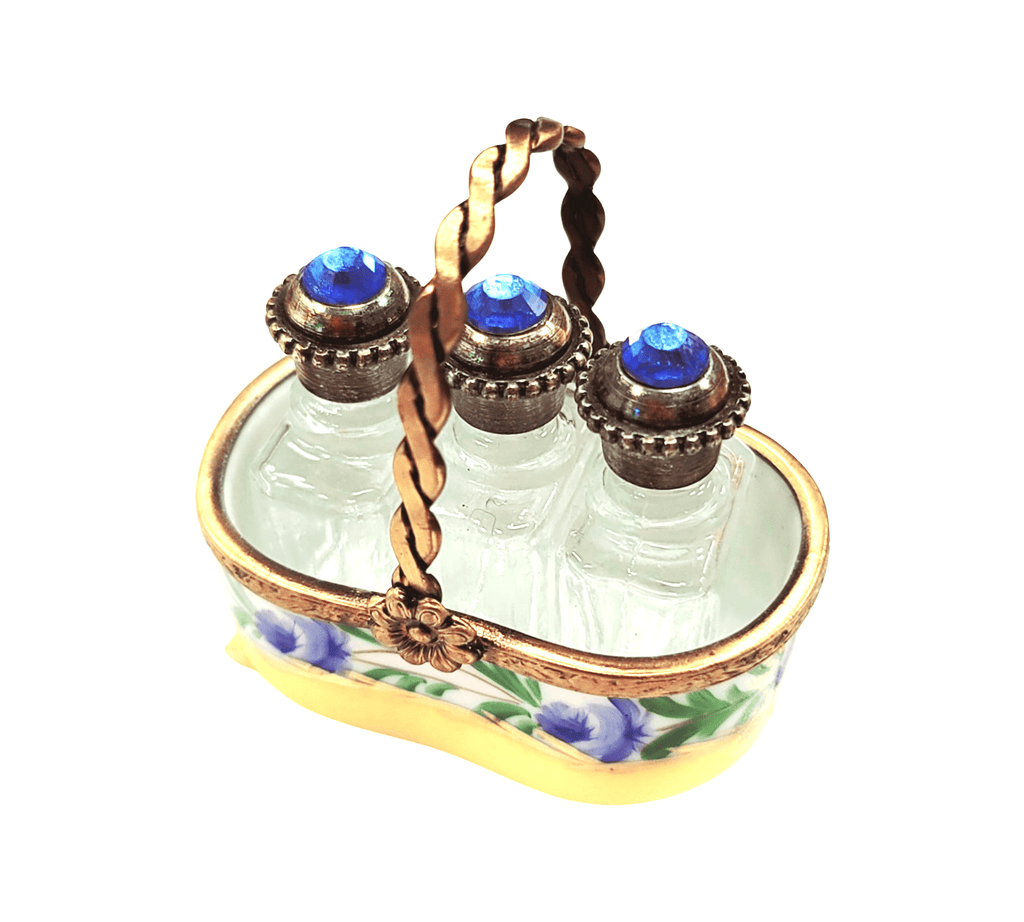 Limoges Boutique presents the 3 Perfumes in Yellow Basket, a genuine Limoges box painted by hand in France