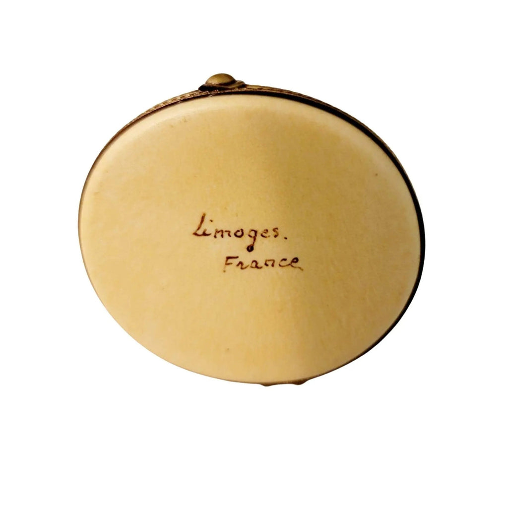 Every brushstroke by hand on the Safari Pith Hat Jungle Hat Limoges box from France