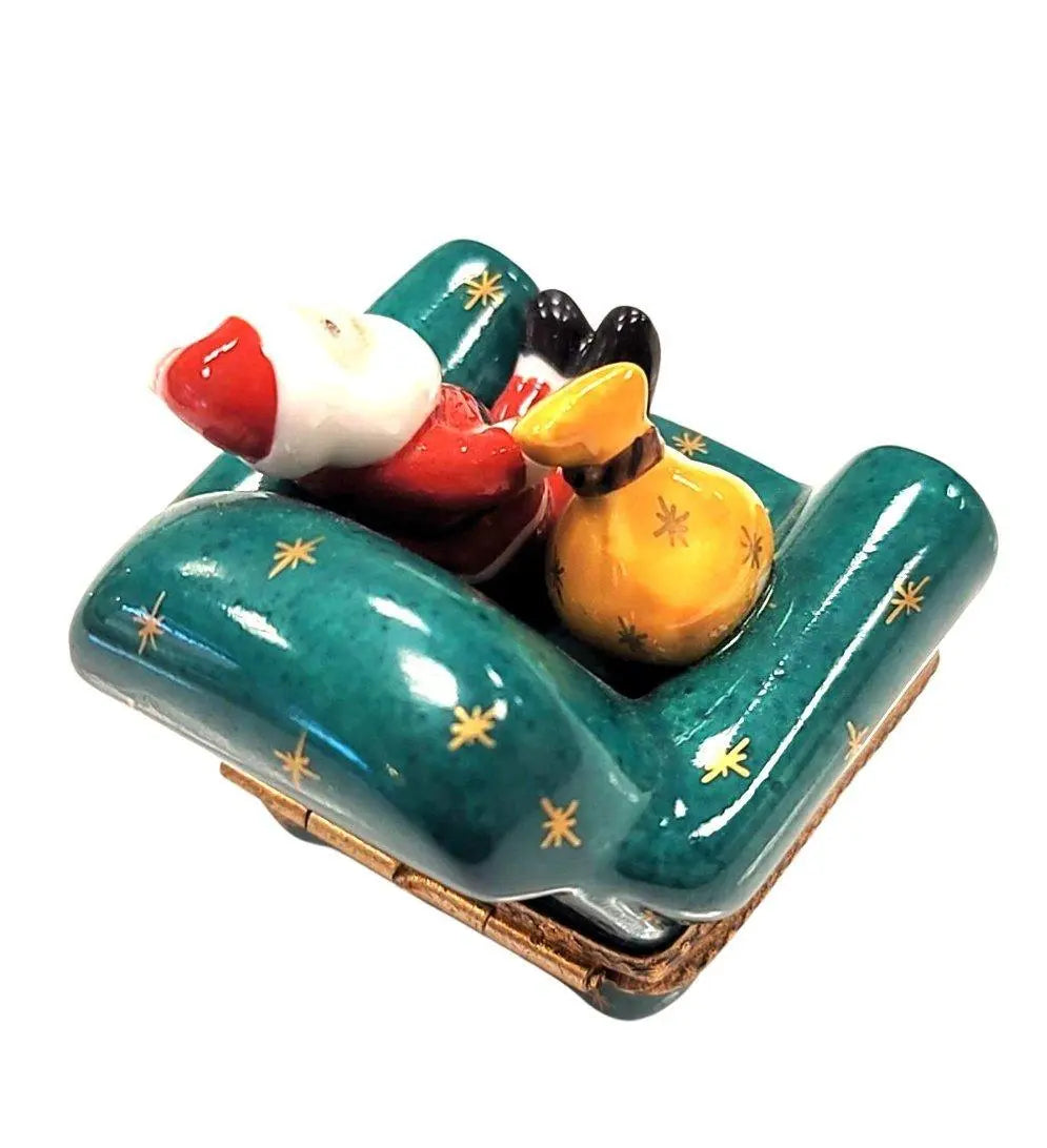 The Santa Claus with Bag on Green Christmas Chair, a Limoges keepsake with true French charm
