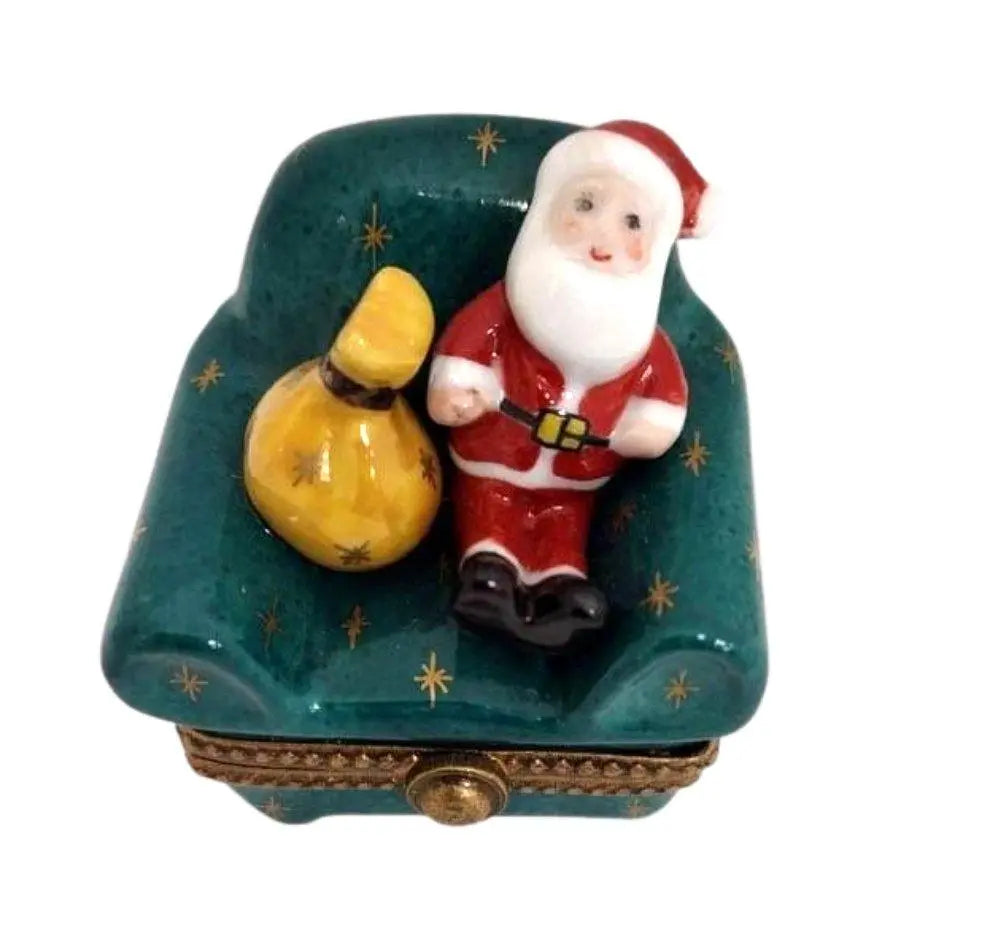 Santa Claus with Bag on Green Christmas Chair Limoges box, an heirloom-quality piece for collectors