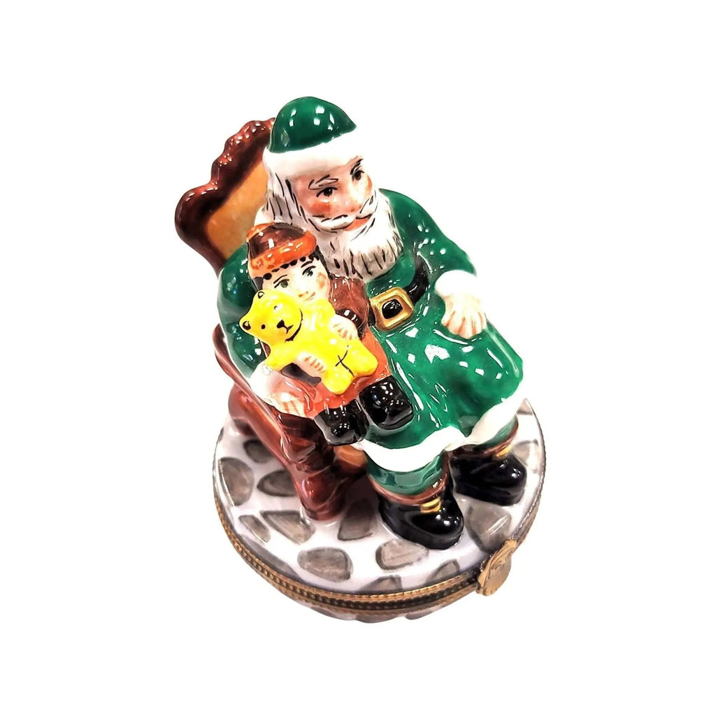 Santa Child Lap Green Coat Limoges Box, a hand-painted Limoges porcelain gift