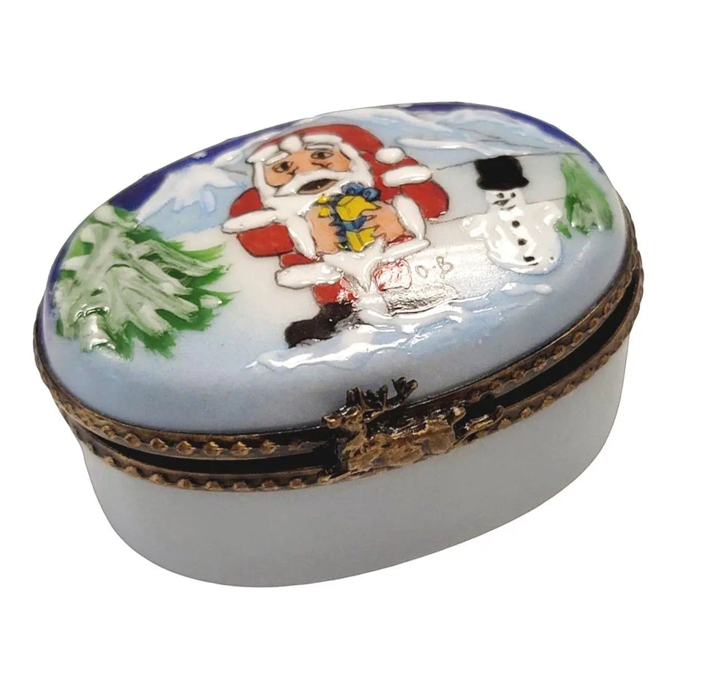 Santa W Snowman Oval Limoges Box Figurine for Holiday Cheer, a hand-painted Limoges porcelain gift