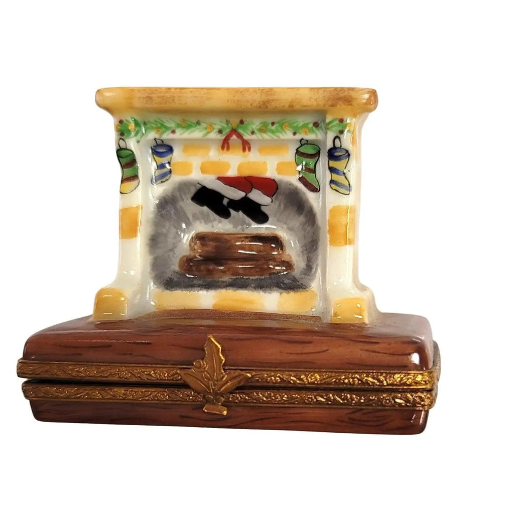 Santa in Fireplace Christmas Limoges Box Figurine Gift, a hand-painted Limoges porcelain gift
