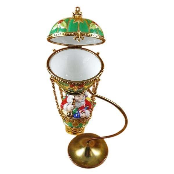 Fine art lovers will admire this Santa in Hot Air Balloon with Brass Stand Limoges box