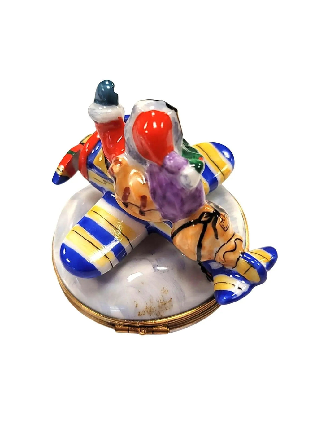 The painter's artistry shows on this Santa on Airplane Limoges box