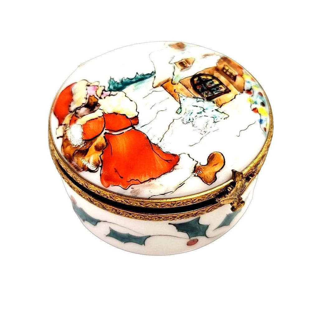 Santa Delivering Gifts on Round Limoges Box, a hand-painted Limoges porcelain gift