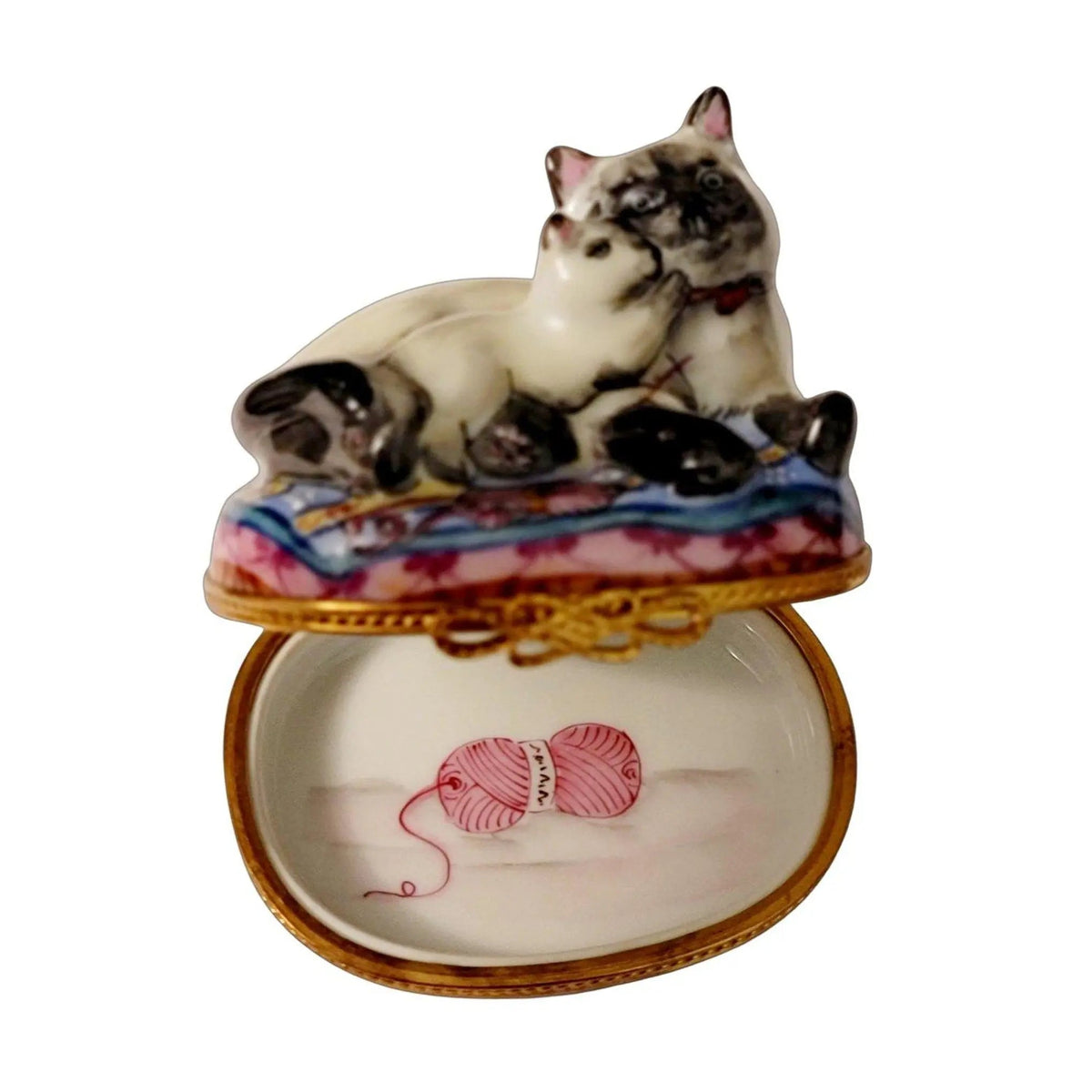 Fine French craftsmanship on the Siamese Cat Kitten 1 750 Limoges box, painted by hand